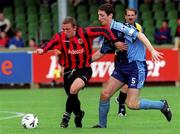 27 August 2000; Gary O'Neill of Bohemians in action against Clive Delaney of UCD during the Eircom League Premier Division match between UCD and Bohemians at Belfield Park in Dublin. Photo by David Maher/Sportsfile