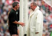 27 August 2000; Referee Paddy Russell speaks to one of his umpires during the Bank of Ireland All-Ireland Senior Football Championship Semi-Final match between Galway and Kildare at Croke Park in Dublin. Photo by Ray McManus/Sportsfile