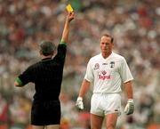 27 August 2000; Willie McCreery of Kildare is shown a yellow card by referee Paddy Russell during the Bank of Ireland All-Ireland Senior Football Championship Semi-Final match between Galway and Kildare at Croke Park in Dublin. Photo by Aoife Rice/Sportsfile