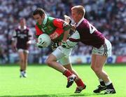 27 August 2000; Dwayne Flynn of Mayo in action against Finian Newman of Westmeath during the All-Ireland Minor Football Championship Semi-Final match between Mayo and Westmeath at Croke Park in Dublin. Photo by John Mahon/Sportsfile