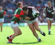27 August 2000; Colin Whyte of Westmeath in action against Dermot Geraghty of Mayo during the All-Ireland Minor Football Championship Semi-Final match between Mayo and Westmeath at Croke Park in Dublin. Photo by John Mahon/Sportsfile