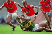20 August 2000; John Crowley of Kerry in action against Gerard Reid of Armagh during the Bank of Ireland All-Ireland Senior Football Championship Semi-Final match between Kerry and Armagh at Croke Park in Dublin. Photo by Ray McManus/Sportsfile