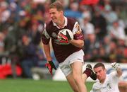 27 August 2000; Michael Donnellan of Galway in action against Padraig Brennan of Kildare during the Bank of Ireland All-Ireland Senior Football Championship Semi-Final match between Galway and Kildare at Croke Park in Dublin. Photo by Matt Browne/Sportsfile