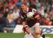 27 August 2000; Michael Donnellan of Galway in action against Padraig Brennan of Kildare during the Bank of Ireland All-Ireland Senior Football Championship Semi-Final match between Galway and Kildare at Croke Park in Dublin. Photo by Matt Browne/Sportsfile