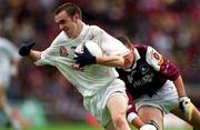 27 August 2000; Tadhg Fennin of Kildare in action against Tomás Meehan of Galway during the Bank of Ireland All-Ireland Senior Football Championship Semi-Final match between Galway and Kildare at Croke Park in Dublin. Photo by Aoife Rice/Sportsfile