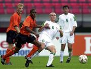 1 September 2000; Barry Quinn of Republic of Ireland in action against Kevin Bobson of Netherlands during the European U21 Championship Qualifying match between Netherlands and Republic of Ireland at the Goffertstadion in Nijmegan, Netherlands. Photo by David Maher/Sportsfile