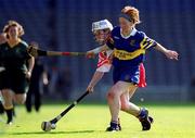 3 September 2000; Elaine Burke of Cork in action against Therese Brophy of Tipperary during the All-Ireland Senior Camogie Championship Final match between Cork and Tipperary at Croke Park in Dublin. Photo by Brendan Moran/Sportsfile