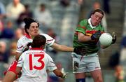 2 September 2000; Yvonne Byrne of Mayo in action against Caroline Kelly and Arlene McCloskey of Tyrone during the TG4 All-Ireland Ladies Football Senior Championship Semi-Final match between Mayo and Tyrone at Croke Park in Dublin. Photo by Aoife Rice/Sportsfile