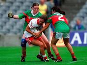 2 September 2000; Caroline Kelly of Tyrone is tackled by Yvonne Byrne, left, and Assumpta Bohan of Mayo during the TG4 All-Ireland Ladies Football Senior Championship Semi-Final match between Mayo and Tyrone at Croke Park in Dublin. Photo by Aoife Rice/Sportsfile
