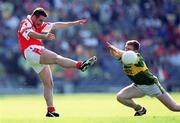 2 September 2000; Barry O'Hagan of Armagh in action against Tomás Ó Sé of Kerry during the Bank of Ireland All-Ireland Senior Football Championship Semi-Final replay match between Kerry and Armagh at Croke Park in Dublin. Photo by Brendan Moran/Sportsfile