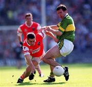 2 September 2000; Mike McCarthy of Kerry in action against Diarmuid Marsden of Armagh during the Bank of Ireland All-Ireland Senior Football Championship Semi-Final replay match between Kerry and Armagh at Croke Park in Dublin. Photo by Brendan Moran/Sportsfile