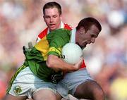 2 September 2000; Liam Hassett of Kerry in action against Andrew McCann of Armagh during the Bank of Ireland All-Ireland Senior Football Championship Semi-Final replay match between Kerry and Armagh at Croke Park in Dublin. Photo by Aoife Rice/Sportsfile