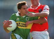 2 September 2000; Maurice Fitzgerald of Kerry in action against Gerard Reid of Armagh during the Bank of Ireland All-Ireland Senior Football Championship Semi-Final replay match between Kerry and Armagh at Croke Park in Dublin. Photo by Brendan Moran/Sportsfile