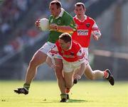 2 September 2000; John Crowley of Kerry in action against Kieran McGeeney of Armagh during the Bank of Ireland All-Ireland Senior Football Championship Semi-Final replay match between Kerry and Armagh at Croke Park in Dublin. Photo by Brendan Moran/Sportsfile