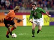 2 September 2000; Robbie Keane of Republic of Ireland in action against Richard Witschge of Netherlands during the FIFA World Cup 2002 Group 2 Qualifying match between the Netherlands and Republic of Ireland at the Amsterdam Arena in Amsterdam, Netherlands. Photo by Matt Browne/Sportsfile