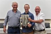4 July 2015; Kilkenny great Tommy Walsh with his uncle Willie Walsh, left, and father Michael Walsh, and the Liam MacCarthy Cup at today’s Bord Gáis Energy Legends Tour at Croke Park, where he relived some of most memorable moments from his playing career. All Bord Gáis Energy Legends Tours include a trip to the GAA Museum, which is home to many exclusive exhibits, including the official GAA Hall of Fame. For booking and ticket information about the GAA legends for this summer’s tours visit www.crokepark.ie/gaa-museum. Croke Park, Dublin.  Picture credit: Brendan Moran / SPORTSFILE