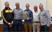 4 July 2015; Kilkenny great Tommy Walsh with from left, Mattie Butler, uncle Willie Walsh, left, and father Michael Walsh, Brendan Corcoran, from Tullaroan, Co. Kilkenny, and the Liam MacCarthy Cup at today’s Bord Gáis Energy Legends Tour at Croke Park, where he relived some of most memorable moments from his playing career. All Bord Gáis Energy Legends Tours include a trip to the GAA Museum, which is home to many exclusive exhibits, including the official GAA Hall of Fame. For booking and ticket information about the GAA legends for this summer’s tours visit www.crokepark.ie/gaa-museum. Croke Park, Dublin.  Picture credit: Brendan Moran / SPORTSFILE