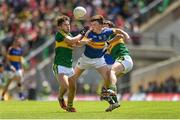 5 July 2015; Emmett Moloney, Tipperary, in action against Sean O'Shea, left, and Daniel O'Brien, Kerry. Electric Ireland Munster GAA Football Minor Championship Final, Kerry v Tipperary. Fitzgerald Stadium, Killarney, Co. Kerry. Picture credit: Eoin Noonan / SPORTSFILE