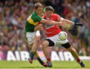 5 July 2015; Barry O’Driscoll, Cork, holds off Stephen O'Brien, Kerry, for a shot on goal which was saved by Kerry goalkeeper Brendan Kealy. Munster GAA Football Senior Championship Final, Kerry v Cork. Fitzgerald Stadium, Killarney, Co. Kerry. Picture credit: Brendan Moran / SPORTSFILE