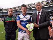 5 July 2015; Shaun Murray, Munster, Dungarvan CBS, Dungarvan GAA Club, Waterford, is presented with his jersey from John Fahy, right, Vice Chairman of the Colleges Comittee and Stephen Leddy, Masita, during the Masita GAA All-Ireland Post Primary Schools Poc Fada Final & Presentation at Kilkenny v Dublin - Electric Ireland Leinster GAA Hurling Minor Championship Final. Croke Park, Dublin. Picture credit: David Maher / SPORTSFILE