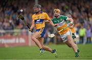 4 July 2015; Shane Golden, Clare, in action against Colin Egan, Offaly. GAA Hurling All-Ireland Senior Championship, Round 1, Clare v Offaly. Cusack Park, Ennis, Co. Clare. Picture credit: Stephen McCarthy / SPORTSFILE