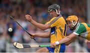 4 July 2015; Shane Golden, Clare, in action against Colin Egan, Offaly. GAA Hurling All-Ireland Senior Championship, Round 1, Clare v Offaly. Cusack Park, Ennis, Co. Clare. Picture credit: Stephen McCarthy / SPORTSFILE