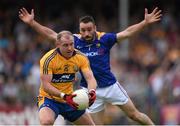 4 July 2015; Pat Burke, Clare, in action against Diarmuid Masterson, Longford. GAA Football All-Ireland Senior Championship, Round 2A, Clare v Longford. Cusack Park, Ennis, Co. Clare. Picture credit: Stephen McCarthy / SPORTSFILE
