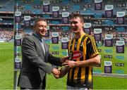 5 July 2015; Pictured is Tony Dunlea, Manager Business Markets Sales, Electric Ireland, proud sponsor of the GAA All-Ireland Minor Championships, presenting Richie Leahy, from Kilkenny, with the Player of the Match award for his outstanding performance in the Electric Ireland Leinster Minor Football Championship Final. Throughout the Championship fans can follow the action, support the Minors and be a part of something major through the hashtag #ThisIsMajor. Croke Park, Dublin. Picture credit: Ray McManus / SPORTSFILE