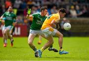 5 July 2015; Ryan Murray, Antrim, in action against Mickey Jones, Fermanagh. GAA Football All-Ireland Senior Championship Round 2A, Fermanagh v Antrim. Brewster Park, Enniskillen, Co. Fermanagh. Photo by Sportsfile