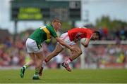 5 July 2015; Kevin O'Driscoll, Cork, in action against Johnny Buckley, Kerry. Munster GAA Football Senior Championship Final, Kerry v Cork. Fitzgerald Stadium, Killarney, Co. Kerry. Picture credit: Eoin Noonan / SPORTSFILE