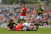 5 July 2015; Eoin Cadogan, Cork, in action against Stephen O'Brien, left, and Kieran Donaghy, Kerry. Munster GAA Football Senior Championship Final, Kerry v Cork. Fitzgerald Stadium, Killarney, Co. Kerry. Picture credit: Eoin Noonan / SPORTSFILE
