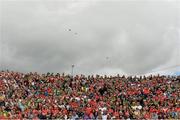 5 July 2015; Cork and Kerry supporters stand for the national anthem before the game. Munster GAA Football Senior Championship Final, Kerry v Cork. Fitzgerald Stadium, Killarney, Co. Kerry. Picture credit: Brendan Moran / SPORTSFILE
