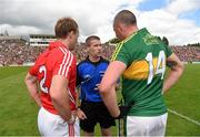 5 July 2015; Referee Padraig Hughes speaks with captains Michael Shields, Cork, and Kieran Donaghy, Kerry. Munster GAA Football Senior Championship Final, Kerry v Cork. Fitzgerald Stadium, Killarney, Co. Kerry. Picture credit: Stephen McCarthy / SPORTSFILE