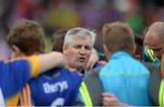5 July 2015; Tipperary manager Charlie McGeever speaks to his players after the game. Electric Ireland Munster GAA Football Minor Championship Final, Kerry v Tipperary. Fitzgerald Stadium, Killarney, Co. Kerry. Picture credit: Eoin Noonan / SPORTSFILE