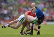 5 July 2015; Micheal Shields, Cork, during a coming together with Paul Geaney, Kerry. Munster GAA Football Senior Championship Final, Kerry v Cork. Fitzgerald Stadium, Killarney, Co. Kerry. Picture credit: Eoin Noonan / SPORTSFILE