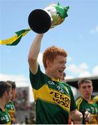 5 July 2015; Brandon Barrett, Kerry, celebrates with the cup after the game. Electric Ireland Munster GAA Football Minor Championship Final, Kerry v Tipperary. Fitzgerald Stadium, Killarney, Co. Kerry. Picture credit: Eoin Noonan / SPORTSFILE