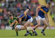 5 July 2015; Conor Geaney, Kerry, in action against Alan Tynan, left and Mark Kehoe, Tipperary. Electric Ireland Munster GAA Football Minor Championship Final, Kerry v Tipperary. Fitzgerald Stadium, Killarney, Co. Kerry. Picture credit: Eoin Noonan / SPORTSFILE