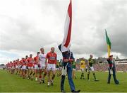 5 July 2015; Both teams during the parade before the game. Munster GAA Football Senior Championship Final, Kerry v Cork. Fitzgerald Stadium, Killarney, Co. Kerry. Picture credit: Eoin Noonan / SPORTSFILE
