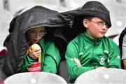 5 July 2015; Young Kilkenny supporters brave the rain. Leinster GAA Hurling Senior Championship Final, Kilkenny v Galway. Croke Park, Dublin. Picture credit: Cody Glenn / SPORTSFILE