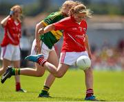 5 July 2015; Molly Kelleher, Ballygarvan NS, Cork, is tackled by Grainne Walsh, Scoil Scairteach an Ghleanna, Kerry, during the Munster GAA Primary Game. Munster GAA Football Senior Championship Final, Kerry v Cork. Fitzgerald Stadium, Killarney, Co. Kerry Picture credit: Brendan Moran / SPORTSFILE