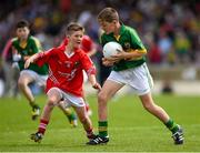 5 July 2015; Tom Doyle, Monastery NS, Killarney, Kerry, is tackled by Daire de Búrca, Gaelscoil na Dubhglaise, during the Munster GAA Primary Game. Munster GAA Football Senior Championship Final, Kerry v Cork. Fitzgerald Stadium, Killarney, Co. Kerry. Picture credit: Stephen McCarthy / SPORTSFILE