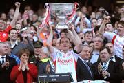 21 September 2008; Tyrone captain Brian Dooher lifts the Sam Maguire Cup after victory over Kerry. GAA Football All-Ireland Senior Championship Final, Kerry v Tyrone, Croke Park, Dublin. Picture credit: Brendan Moran / SPORTSFILE