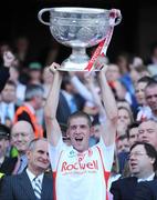 21 September 2008; Tyrone's Kevin Hughes lifts the Sam Maguire Cup after victory over Kerry. GAA Football All-Ireland Senior Championship Final, Kerry v Tyrone, Croke Park, Dublin. Picture credit: Brendan Moran / SPORTSFILE
