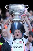 21 September 2008; Tyrone manager Mickey Harte lifts the Sam Maguire Cup after victory over Kerry. GAA Football All-Ireland Senior Championship Final, Kerry v Tyrone, Croke Park, Dublin. Picture credit: Brendan Moran / SPORTSFILE