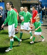 10 September 2008; Northern Ireland's David Healy makes his way onto the field along with his 3 year old son Jude and 7 year old daughter Taylor. 2010 World Cup Qualifier, Northern Ireland v Czech Republic, Windsor Park, Belfast, Co. Antrim. Picture credit; Oliver McVeigh / SPORTSFILE