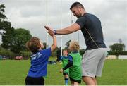 8 July 2015; Kane Douglas and Mick Kearney of Leinster Rugby came out to the Bank of Ireland Summer Camp to meet up with some local young rugby talent in Kilkenny RFC. Pictured Mick Kearney with participant Oisin Barry. Kilkenny RFC, Kilkenny. Picture credit: Seb Daly / SPORTSFILE