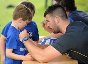 8 July 2015; Kane Douglas and Mick Kearney of Leinster Rugby came out to the Bank of Ireland Summer Camp to meet up with some local young rugby talent in Kilkenny RFC. Pictured is Mick Kearney signing a jersey for one of the participants at the Ireland Summer Camps. Kilkenny RFC, Kilkenny. Picture credit: Seb Daly / SPORTSFILE