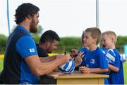 8 July 2015; Kane Douglas and Mick Kearney of Leinster Rugby came out to the Bank of Ireland Summer Camp to meet up with some local young rugby talent in Kilkenny RFC. Pictured is Kane Douglas signing a rugby ball for one of the participants at the Ireland Summer Camps. Kilkenny RFC, Kilkenny. Picture credit: Seb Daly / SPORTSFILE