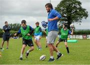 8 July 2015; Kane Douglas and Mick Kearney of Leinster Rugby came out to the Bank of Ireland Summer Camp to meet up with some local young rugby talent in Kilkenny RFC. Pictured is Kane Douglas taking part in a group activity. Kilkenny RFC, Kilkenny. Picture credit: Seb Daly / SPORTSFILE