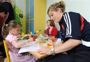 29 September 2008; Cork's Valerie Mulcahy with four year old Sarah O'Toole, from Watergrasshill, Co. Cork, during a visit to Our Lady's Hospital for Sick Chidren in Crumlin. Crumlin, Co. Dublin. Picture credit: Pat Murphy / SPORTSFILE